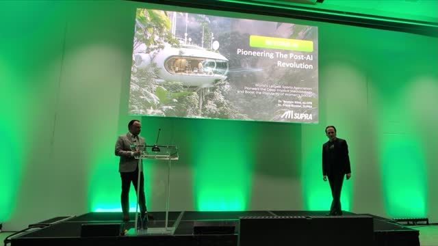 Dr. Frank Buckler on stage at IIEX 2026 in Washington, DC (video still)